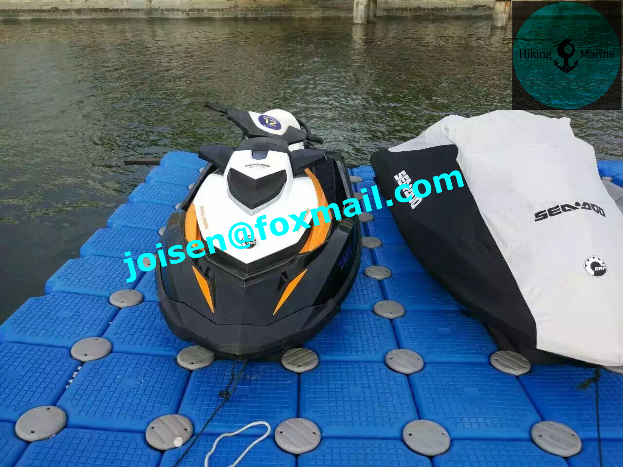 blue jet ski boat parking floating platform cube